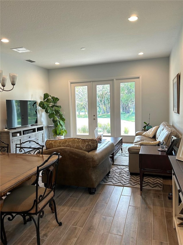 2042 Key Bay Trl, Kissimmee, FL 34747 - living area with wood finished floors and recessed lighting