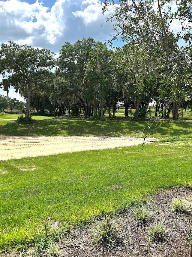 2042 Key Bay Trl, Kissimmee, FL 34747 - view of property's community with a lawn