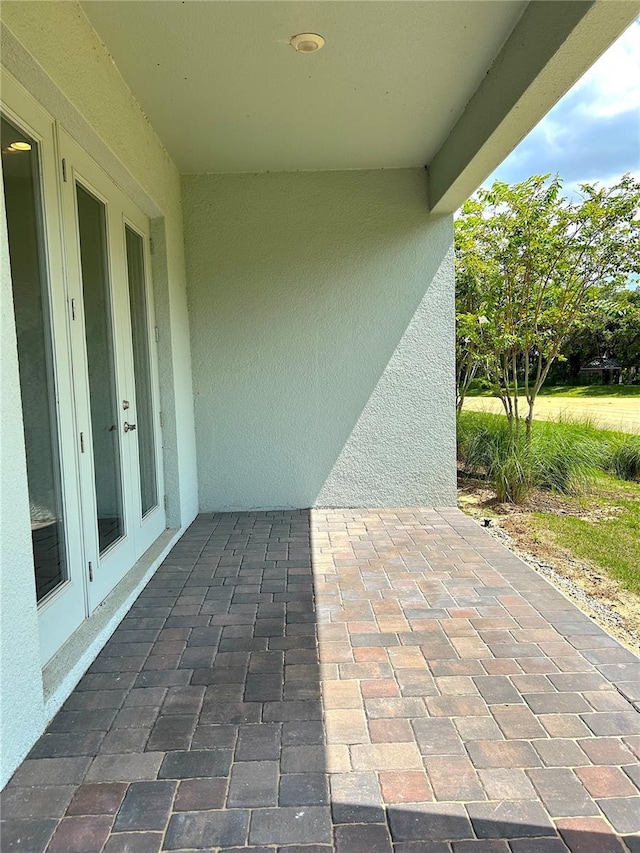 2042 Key Bay Trl, Kissimmee, FL 34747 - view of patio featuring french doors