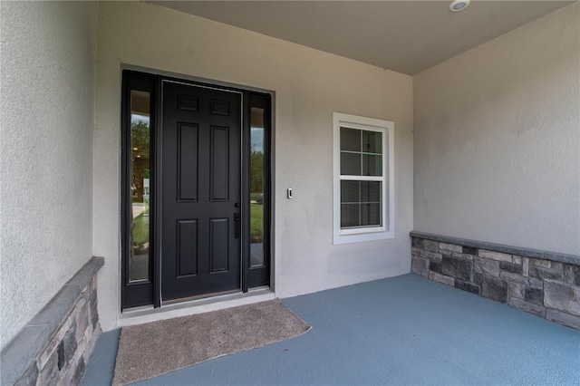 5908 SW 115 Street Rd, Ocala, FL 34476 - property entrance with stucco siding