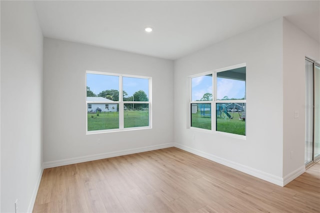 5908 SW 115 Street Rd, Ocala, FL 34476 - spare room featuring light wood-style floors and recessed lighting