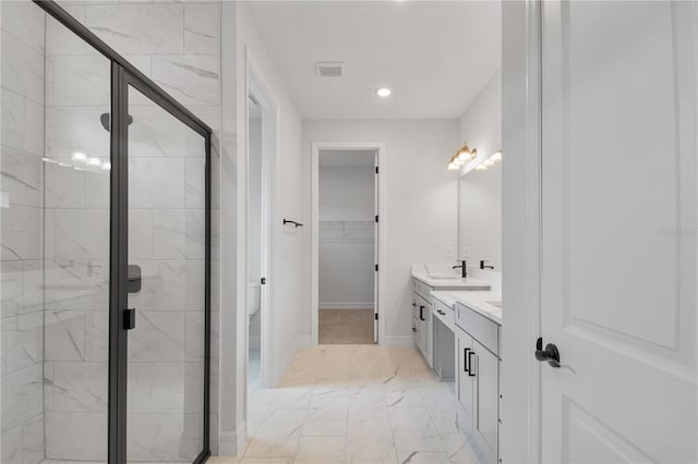 5908 SW 115 Street Rd, Ocala, FL 34476 - full bath with double vanity, a stall shower, marble finish floors, a walk in closet, and recessed lighting