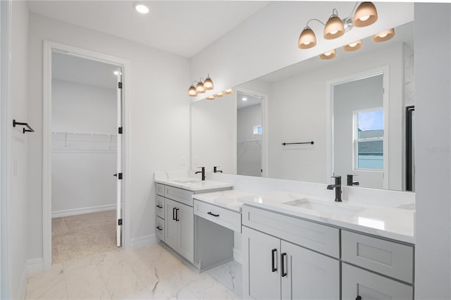5908 SW 115 Street Rd, Ocala, FL 34476 - full bath with double vanity, a walk in closet, marble look tile flooring, and recessed lighting
