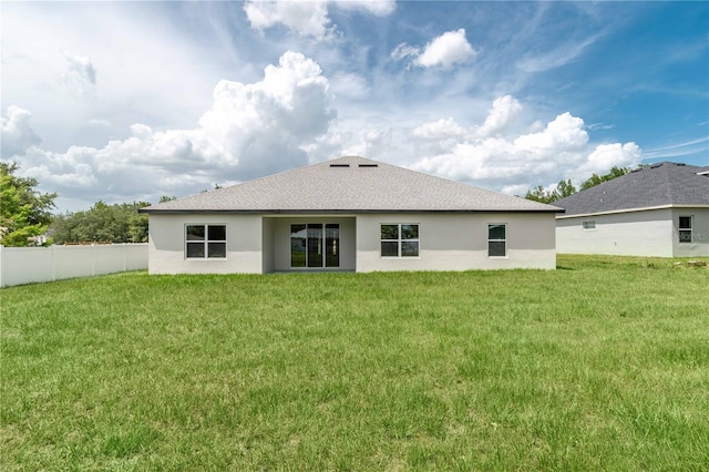 5908 SW 115 Street Rd, Ocala, FL 34476 - back of property featuring stucco siding and a shingled roof
