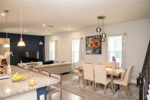 5963 Glory Bower Dr, Winter Garden, FL 34787 - dining space with plenty of natural light, light wood-style flooring, and recessed lighting