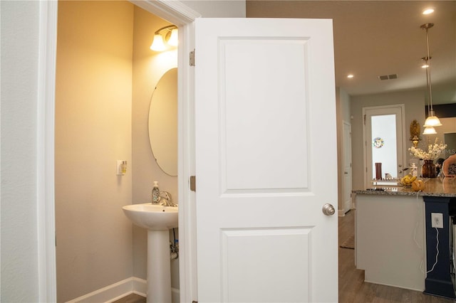 5963 Glory Bower Dr, Winter Garden, FL 34787 - bathroom featuring wood finished floors and recessed lighting