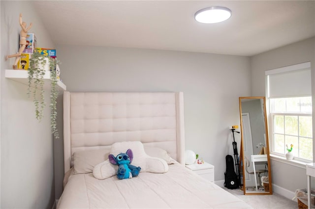 5963 Glory Bower Dr, Winter Garden, FL 34787 - carpeted bedroom with baseboards