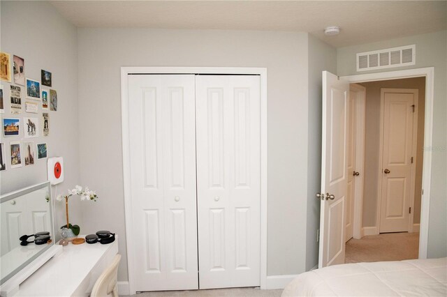 5963 Glory Bower Dr, Winter Garden, FL 34787 - bedroom with a closet and light carpet