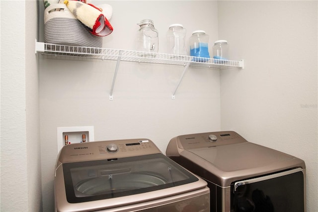 5963 Glory Bower Dr, Winter Garden, FL 34787 - laundry room featuring washing machine and clothes dryer