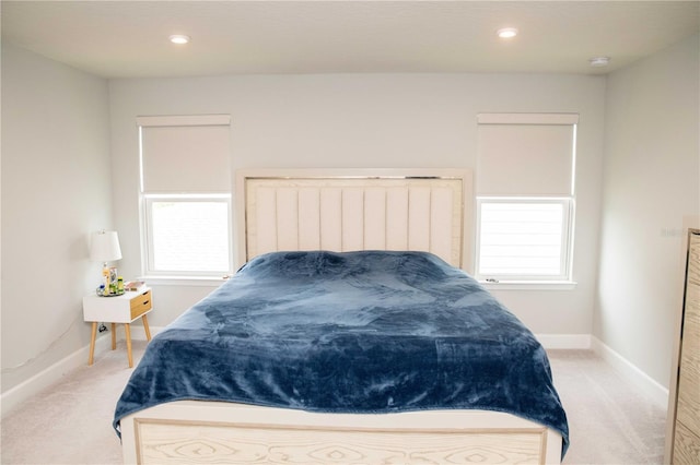 5963 Glory Bower Dr, Winter Garden, FL 34787 - bedroom with light colored carpet, multiple windows, and recessed lighting