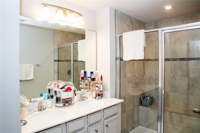 5963 Glory Bower Dr, Winter Garden, FL 34787 - bathroom featuring double vanity and a stall shower