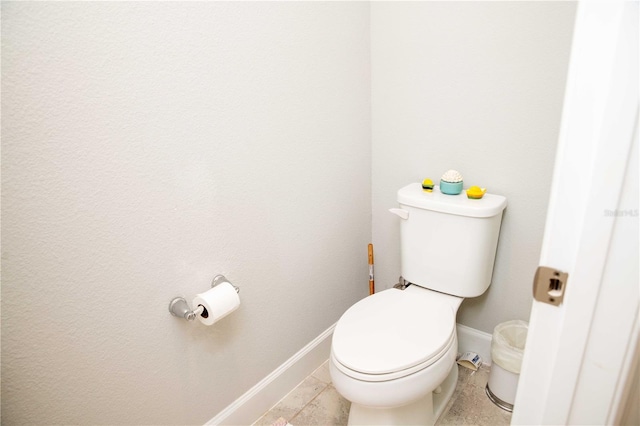 5963 Glory Bower Dr, Winter Garden, FL 34787 - bathroom with toilet and baseboards