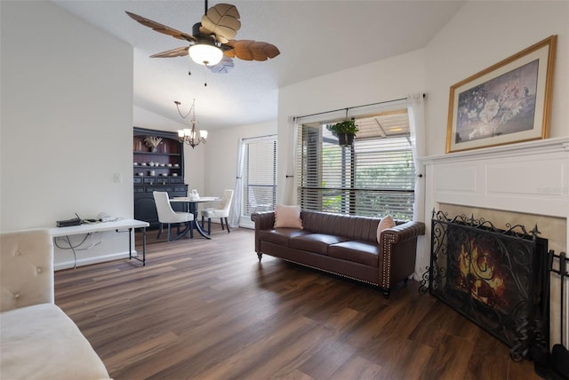 940 Douglas Ave Unit 159, Altamonte Springs, FL 32714 - living room with vaulted ceiling, wood finished floors, a chandelier, a ceiling fan, and a warm lit fireplace