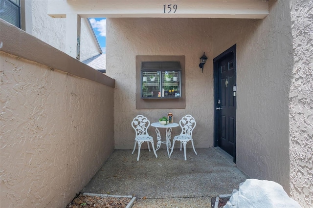 940 Douglas Ave Unit 159, Altamonte Springs, FL 32714 - view of exterior entry featuring stucco siding