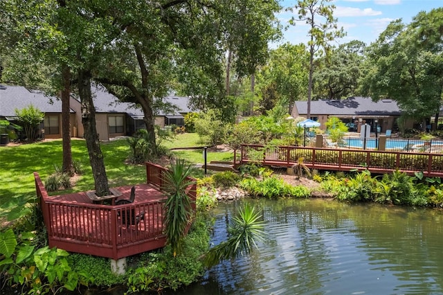 940 Douglas Ave Unit 159, Altamonte Springs, FL 32714 - view of property's community featuring a deck with water view, a lawn, and a swimming pool