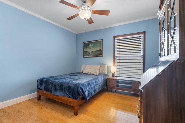 144 Bridgeton St, Davenport, FL 33896 - bedroom with light wood-type flooring, crown molding, and ceiling fan
