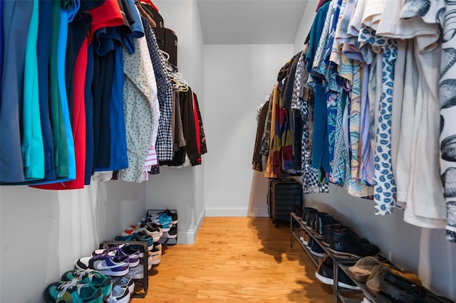 144 Bridgeton St, Davenport, FL 33896 - spacious closet featuring wood finished floors