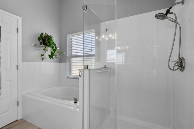 144 Bridgeton St, Davenport, FL 33896 - bathroom featuring a stall shower and a garden tub