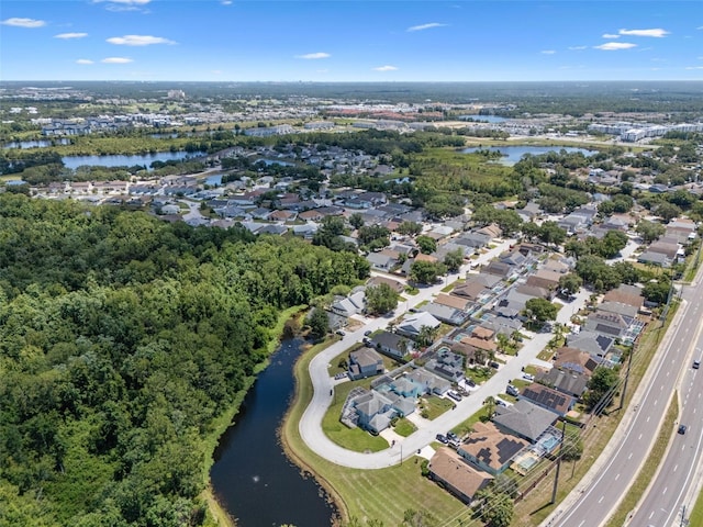 144 Bridgeton St, Davenport, FL 33896 - aerial view of property and surrounding area featuring a nearby body of water and nearby suburban area
