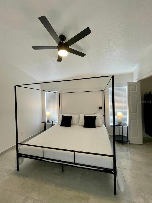2505 Osprey Creek Ct, Kissimmee, FL 34747 - bedroom featuring multiple windows and a ceiling fan