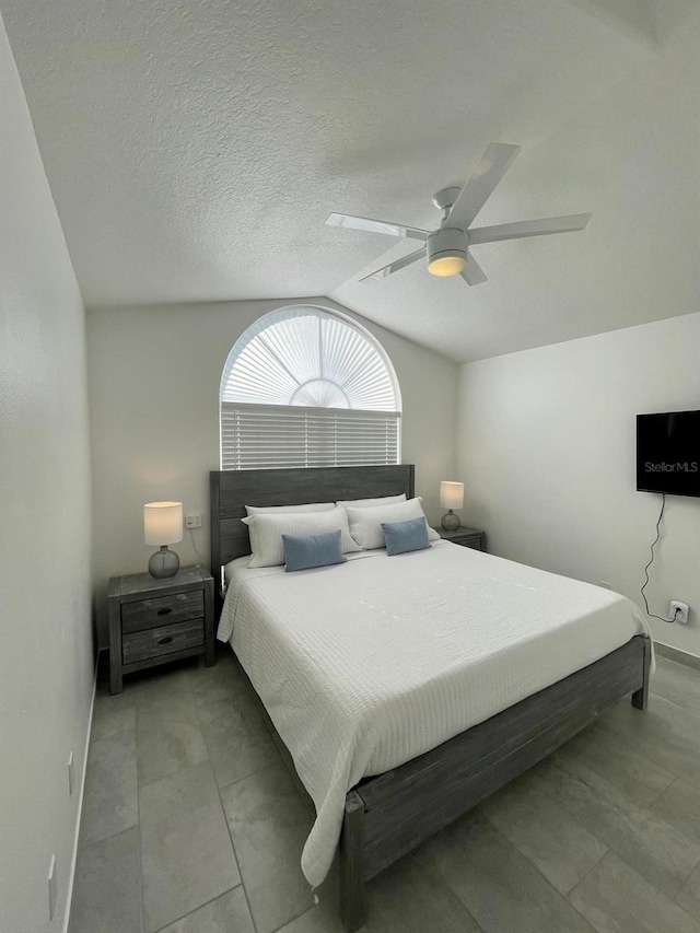 2505 Osprey Creek Ct, Kissimmee, FL 34747 - bedroom featuring lofted ceiling and a ceiling fan
