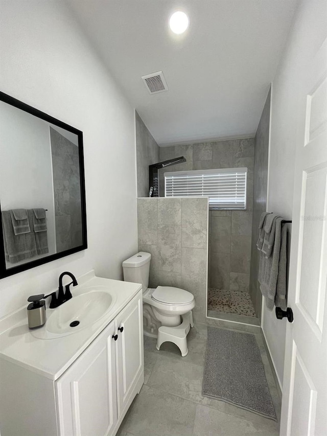 2505 Osprey Creek Ct, Kissimmee, FL 34747 - bathroom featuring a walk in shower and vanity