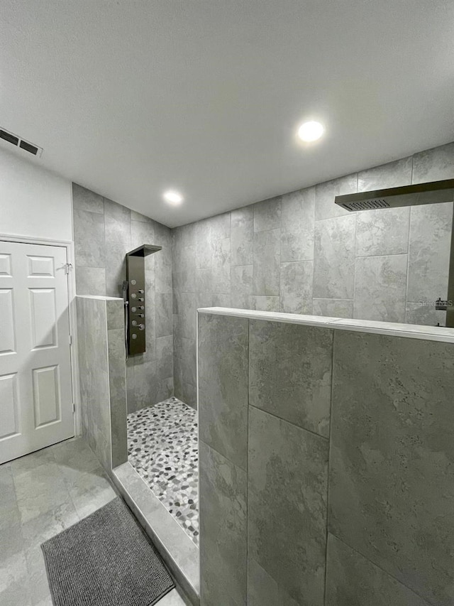 2505 Osprey Creek Ct, Kissimmee, FL 34747 - bathroom with a walk in shower and recessed lighting