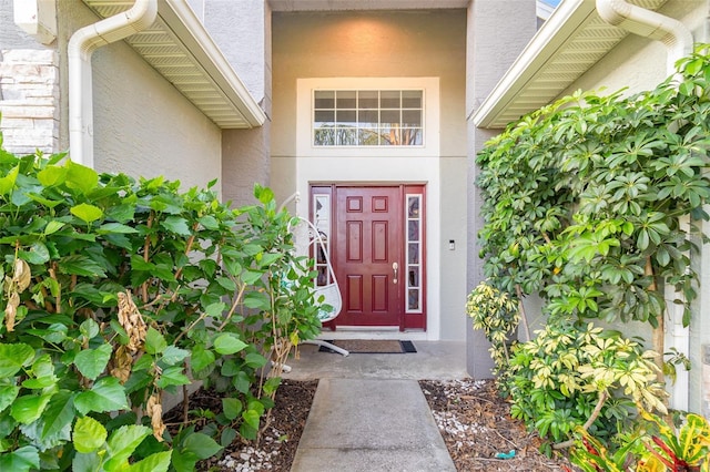 1315 Vista Del Lago Blvd, Dundee, FL 33838 - property entrance with stucco siding