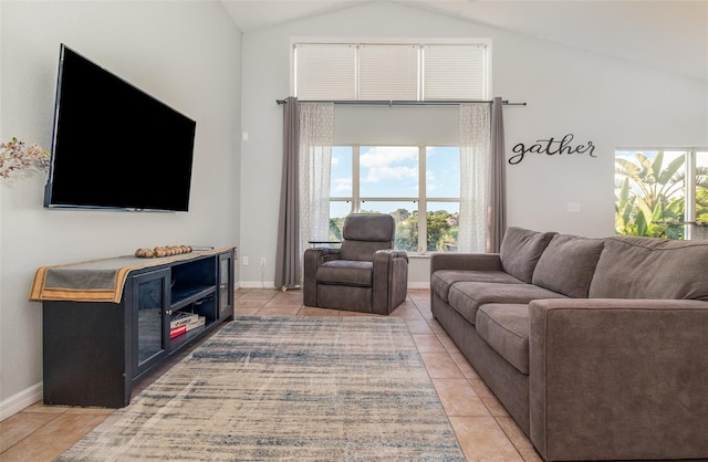 1315 Vista Del Lago Blvd, Dundee, FL 33838 - living room featuring light tile patterned floors and high vaulted ceiling