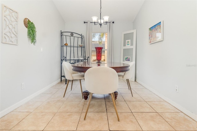 1315 Vista Del Lago Blvd, Dundee, FL 33838 - dining area with a chandelier and light tile patterned flooring