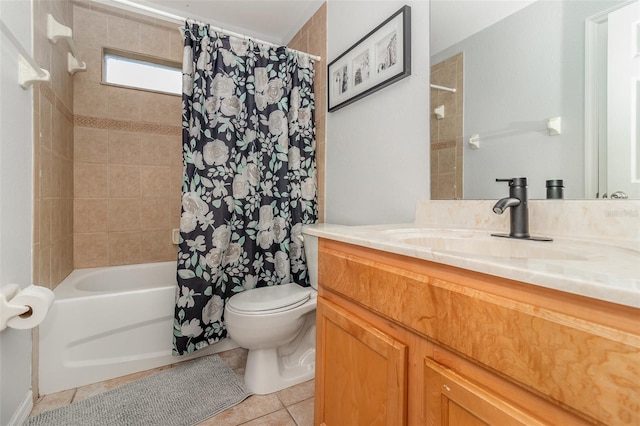 1315 Vista Del Lago Blvd, Dundee, FL 33838 - bathroom featuring shower / bath combo with shower curtain, vanity, and tile patterned floors