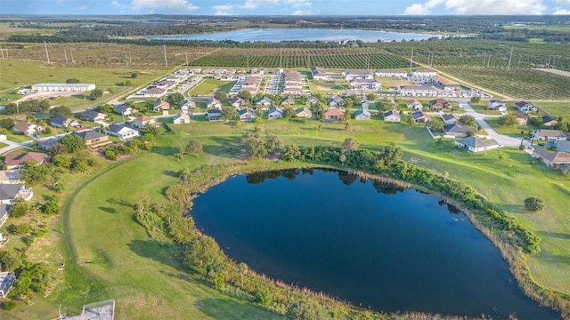1315 Vista Del Lago Blvd, Dundee, FL 33838 - aerial view of property and surrounding area featuring a nearby body of water, large plots for crops, and nearby suburban area