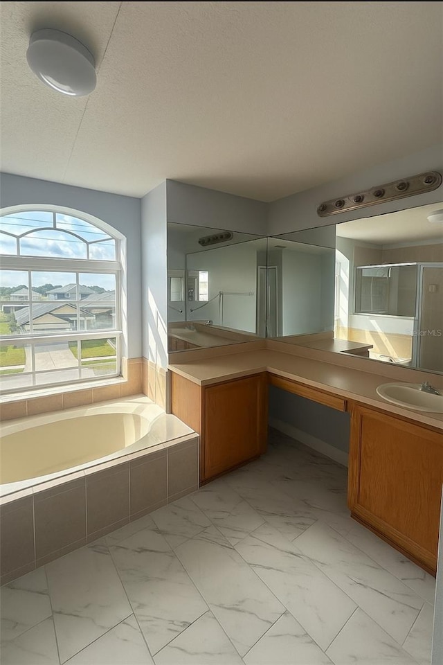 1784 Providence Blvd, Deltona, FL 32725 - full bathroom featuring marble finish flooring, vanity, a shower stall, and a bath