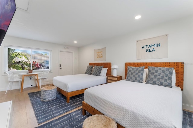 402 S Orlando Ave, Cocoa Beach, FL 32931 - bedroom with recessed lighting and wood finished floors