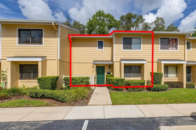 2208 Mcmahon Ct Unit 1033, Orlando, FL 32812 - multi unit property featuring stucco siding
