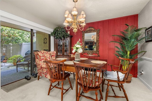 2208 Mcmahon Ct Unit 1033, Orlando, FL 32812 - dining room with carpet floors and a chandelier