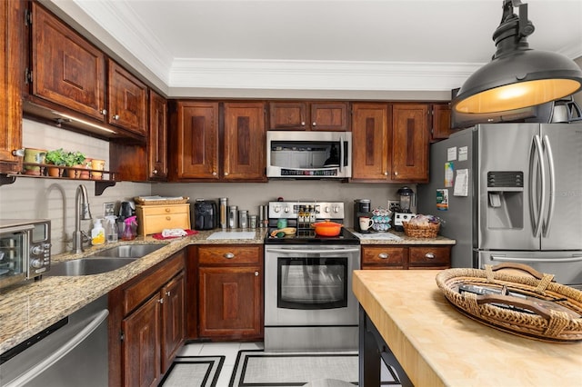 2208 Mcmahon Ct Unit 1033, Orlando, FL 32812 - kitchen featuring stainless steel appliances, light stone countertops, and ornamental molding