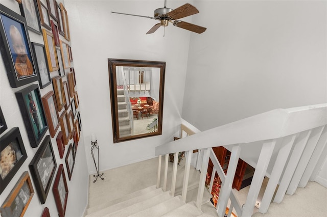 2208 Mcmahon Ct Unit 1033, Orlando, FL 32812 - staircase with carpet floors and a ceiling fan