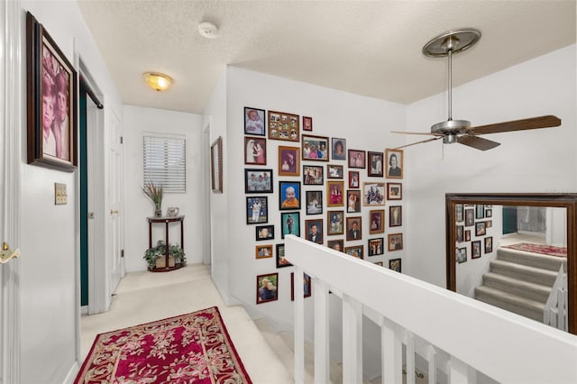 2208 Mcmahon Ct Unit 1033, Orlando, FL 32812 - corridor with carpet floors, a textured ceiling, and stairs