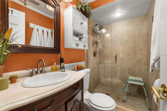 2208 Mcmahon Ct Unit 1033, Orlando, FL 32812 - bathroom with a shower stall, vanity, and crown molding