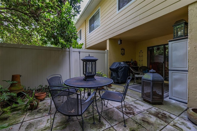 2208 Mcmahon Ct Unit 1033, Orlando, FL 32812 - view of patio featuring grilling area