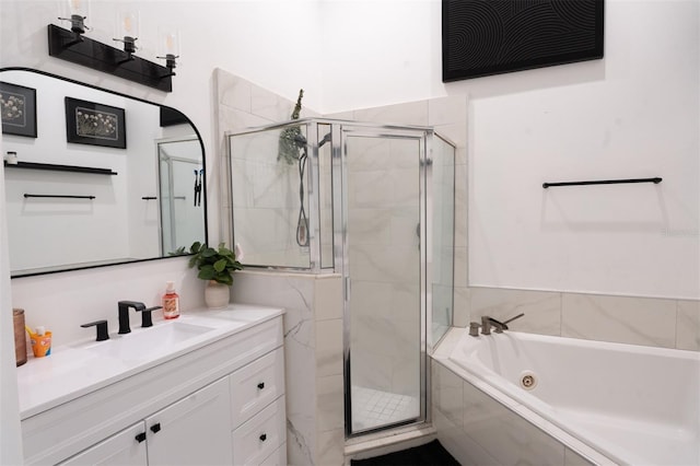 11761 Hatcher Cir, Orlando, FL 32824 - bathroom featuring vanity, a tub with jets, and a stall shower
