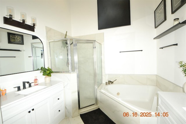 11761 Hatcher Cir, Orlando, FL 32824 - bathroom featuring vanity, a garden tub, and a shower stall