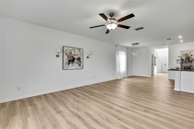 9937 Aqua Miles Path, Wesley Chapel, FL 33545 - unfurnished living room featuring light wood-type flooring, ceiling fan, and recessed lighting