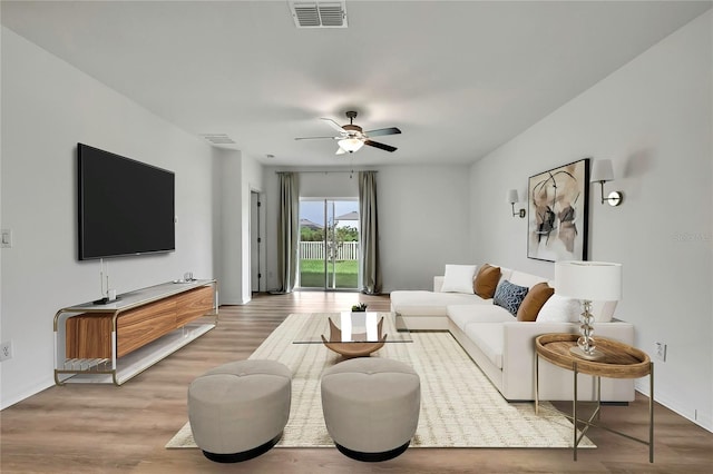 9937 Aqua Miles Path, Wesley Chapel, FL 33545 - living room with a ceiling fan and wood finished floors