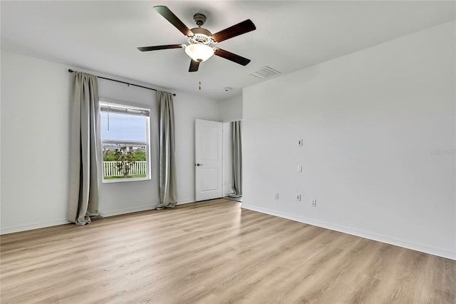 9937 Aqua Miles Path, Wesley Chapel, FL 33545 - unfurnished bedroom with light wood finished floors and a ceiling fan