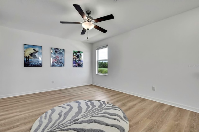 9937 Aqua Miles Path, Wesley Chapel, FL 33545 - unfurnished room with light wood-type flooring and ceiling fan