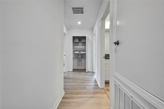 9937 Aqua Miles Path, Wesley Chapel, FL 33545 - hall with baseboards and light wood-style floors