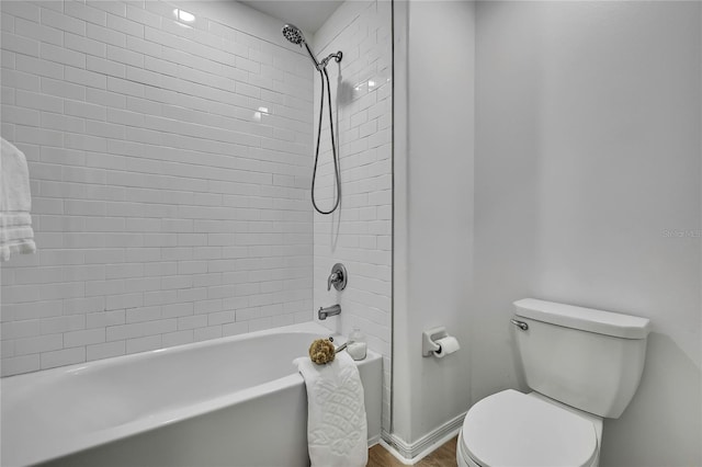 9937 Aqua Miles Path, Wesley Chapel, FL 33545 - full bath with  shower combination and wood finished floors