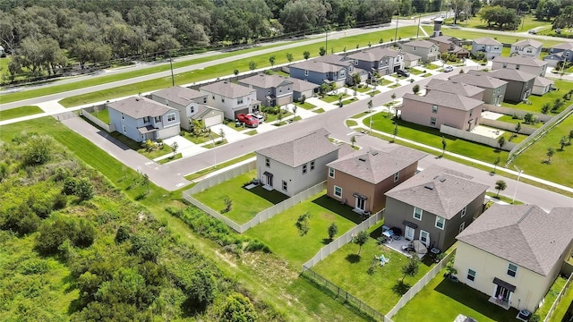 9937 Aqua Miles Path, Wesley Chapel, FL 33545 - aerial perspective of suburban area featuring a forest